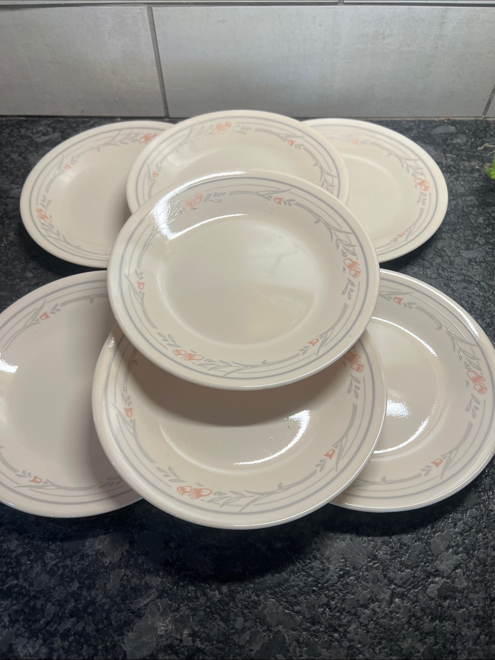 Set of 7 RETIRED VINTAGE Corelle bread plates.